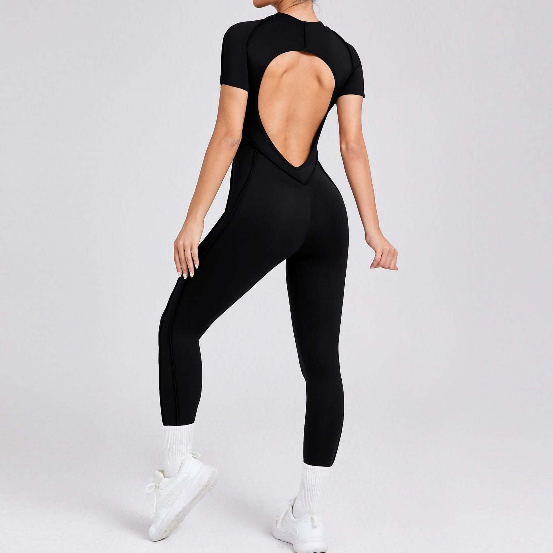 Charming Backless Jumpsuit with a Playful Twist