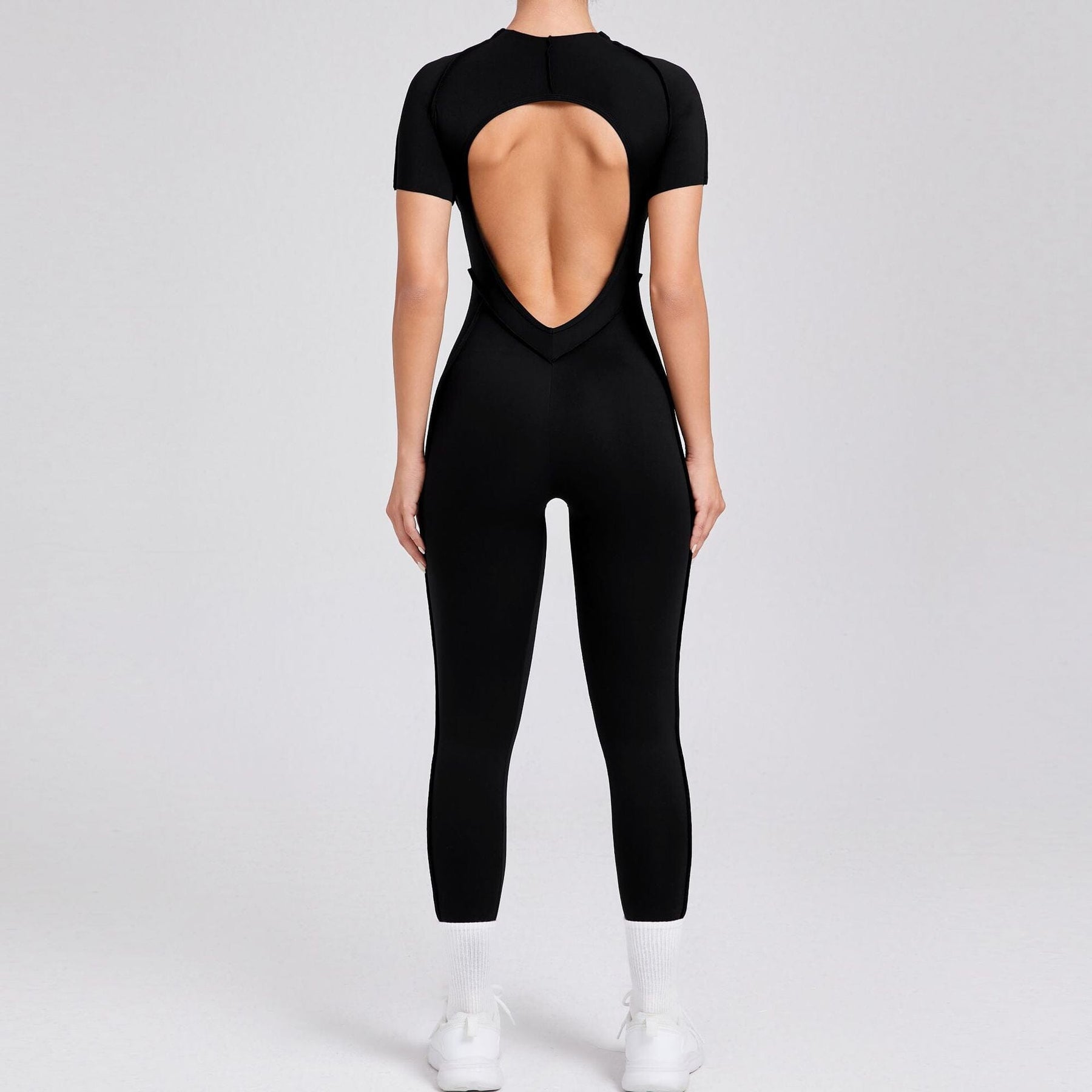 Charming Backless Jumpsuit with a Playful Twist