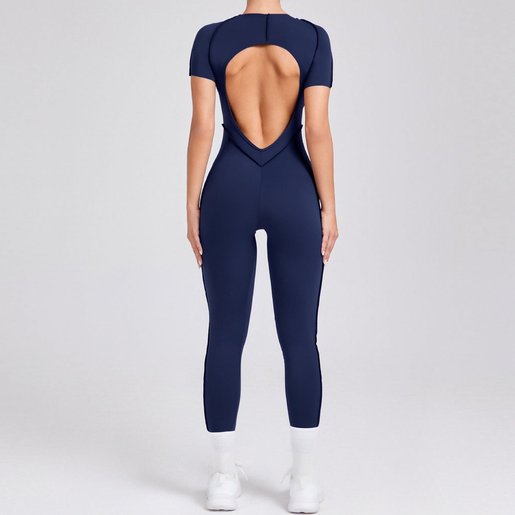 Charming Backless Jumpsuit with a Playful Twist