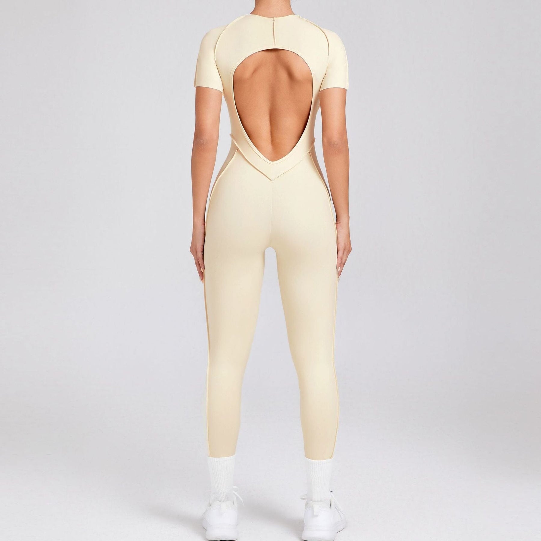 Charming Backless Jumpsuit with a Playful Twist