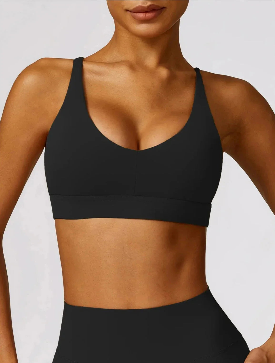 Elevate Your Workout with the Reflex Cross-Back Sports Bra